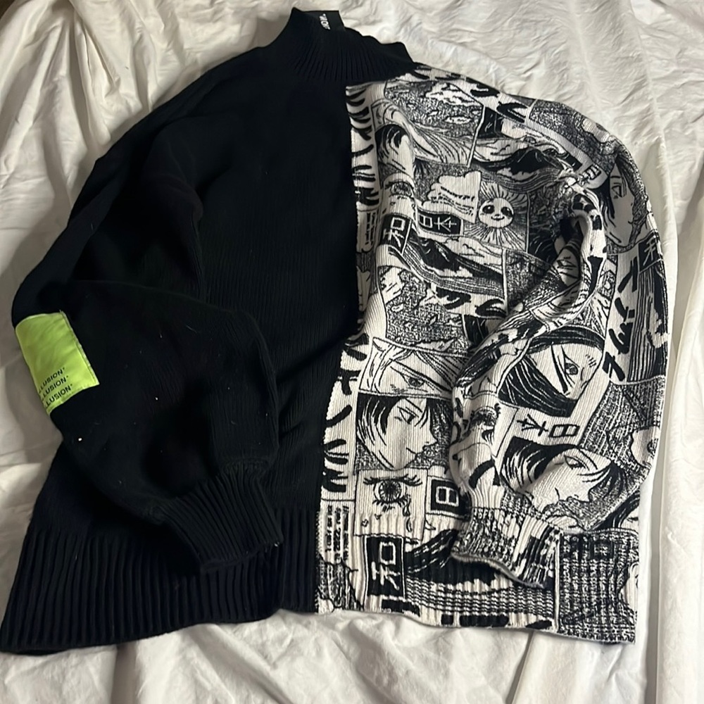 Half and half collusion sweater.